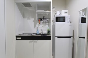 Fridge, microwave, stovetop, cookware/dishes/utensils