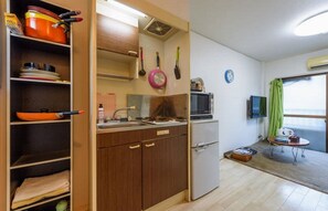 Fridge, microwave, stovetop, cookware/dishes/utensils