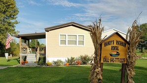 A house with a sign for Randy's Rathbun Rental. - Randy's Rathbun Rental.  "Your Home Away From Home"  Fully Furnished Sleeps 6 (Moravia)