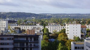 A cityscape with multiple buildings, including residential and possibly commercial structures. - Studio l'Orchidée Mobility lease (1 to 10 months) (Rueil-Malmaison)