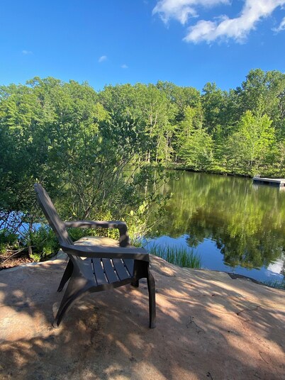 Escape to Banjo Bungalow your cozy 2-bdrm lakefront cabin on 27 private acres