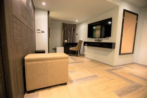Suite Room | Living area | Smart TV, Netflix, streaming services - First Pride Hotel (Bangkok)