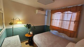 Family Room | Blackout drapes, soundproofing, free WiFi