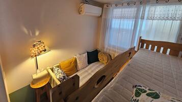 Family Room | Blackout drapes, soundproofing, free WiFi