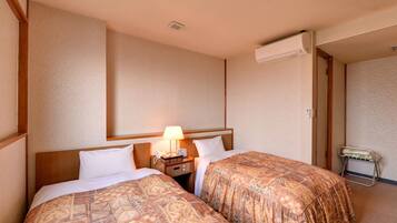 Habitación con 2 camas individuales, no fumadores | Tabla de planchar con plancha, wifi gratis, ropa de cama