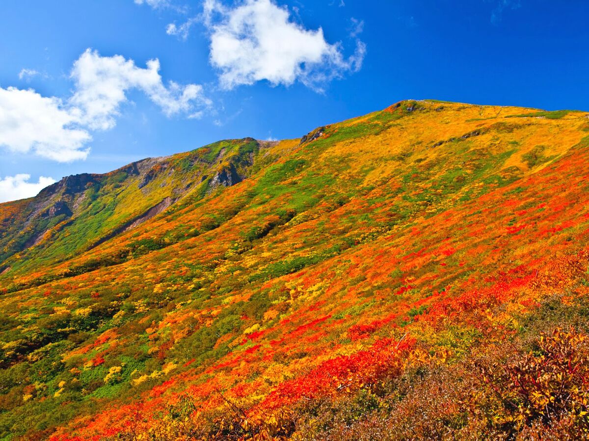 A mountainous landscape with a clear sky.
