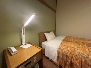 Een strijkplank/strijkijzer, gratis wifi, beddengoed