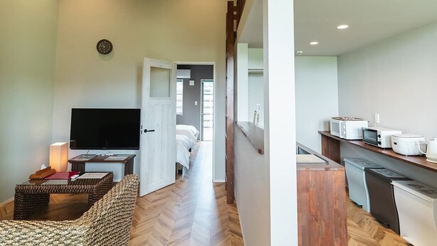 Villa (with Loft) | Oppholdsområde | En 50-tommers Flatskjerm-TV med digitale kanaler samt TV