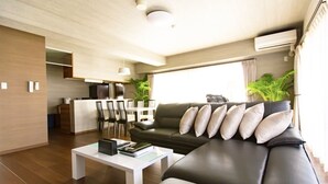 Habitación Grand | Área de sala de estar