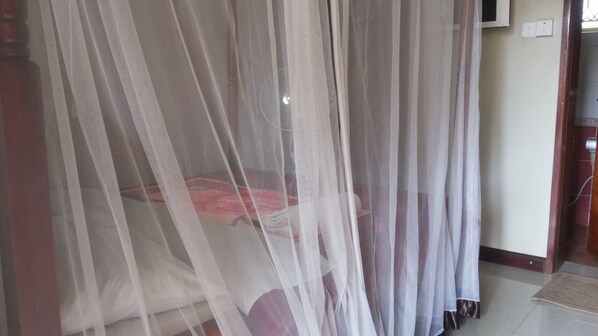 Exclusive Room | Soundproofing, free WiFi, bed sheets - Nasera Suites (Moyo)