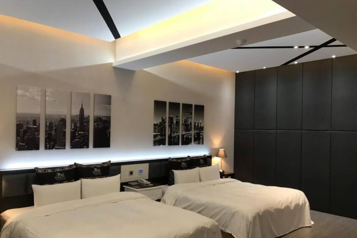 Deluxe Quadruple Room (check-in after 19:00) | Premium bedding, minibar, desk, blackout drapes
