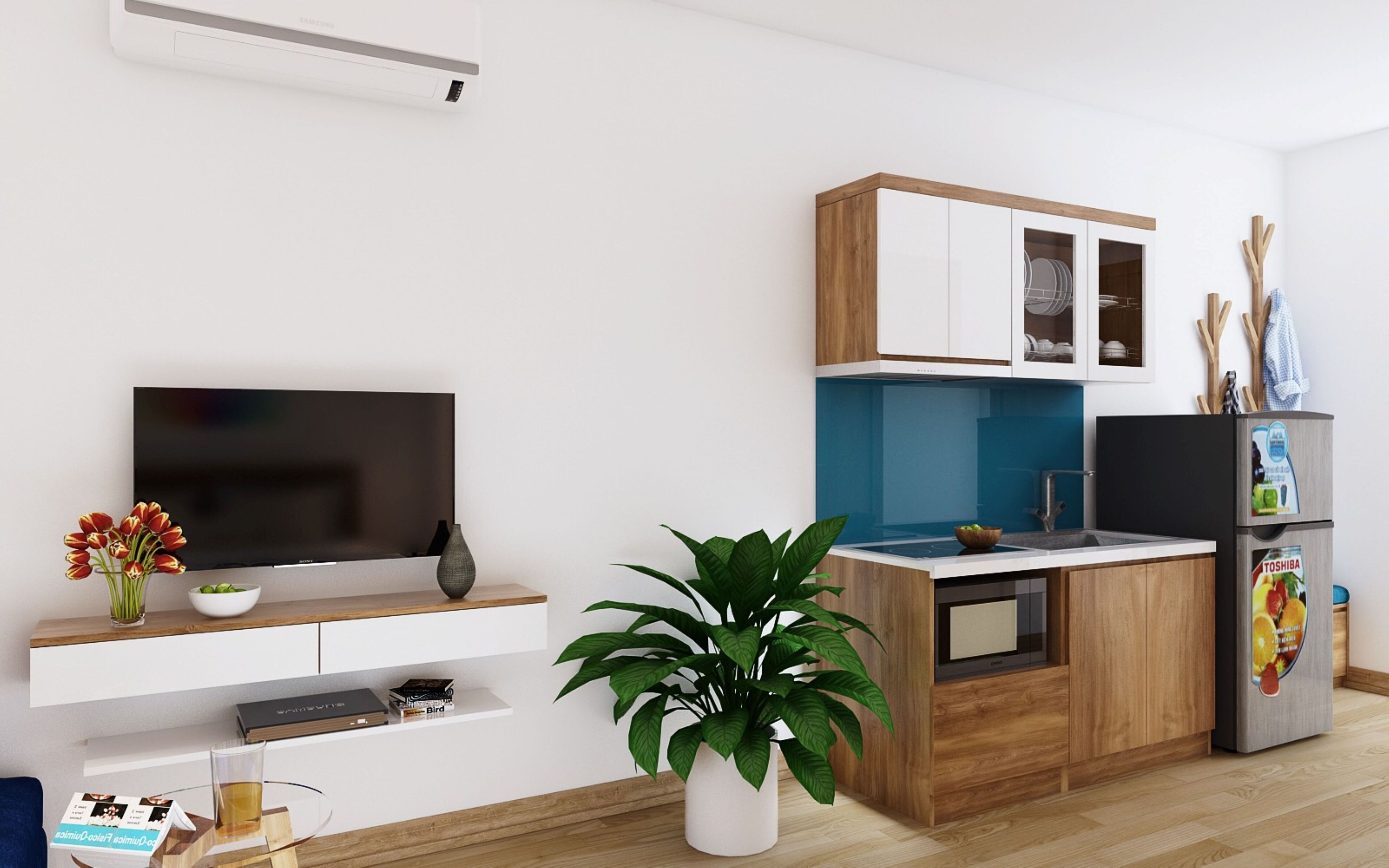 A modern kitchen with a built-in microwave, a sink, and a refrigerator.