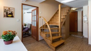 A wooden staircase in a residential interior.