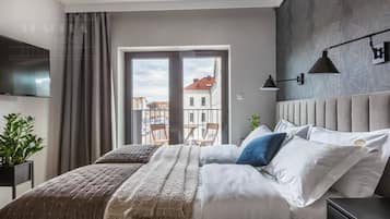 Studio Kota, 2 Tempat Tidur Twin, Bebas Asap Rokok, balkon | Ruang keluarga | Televisi layar datar 40-inci dengan saluran TV kabel dan TV