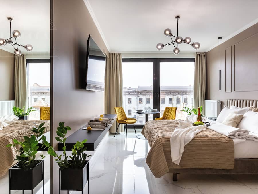 Design Studio, 1 Queen Bed, Non Smoking, Kitchenette | Living area | 40-inch flat-screen TV with cable channels, TV