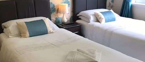 3 slaapkamers, een kluis op de kamer, een strijkplank/strijkijzer