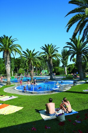 Seasonal outdoor pool, pool loungers