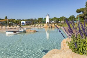 Seasonal outdoor pool, pool loungers