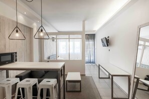 Studio, 1 Bedroom (Industrial) | Living room | Flat-screen TV - Evel's Home Suites (Thessaloniki)