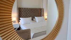 Chambre triple, vue sur la mer