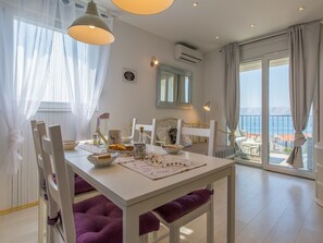Private kitchen | Fridge, microwave, oven, stovetop - Apartments Lavarin (Novi Vinodolski)
