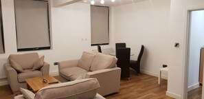 Two Bedroom Apartment | Living room | Flat-screen TV
