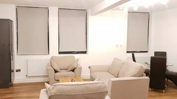 Two Bedroom Apartment | Living room | Flat-screen TV