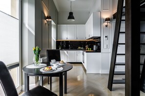 City Apartment, Mezzanine | Living area | Flat-screen TV - Let's Krakow Apartments - Ariańska 6 (Kraków)