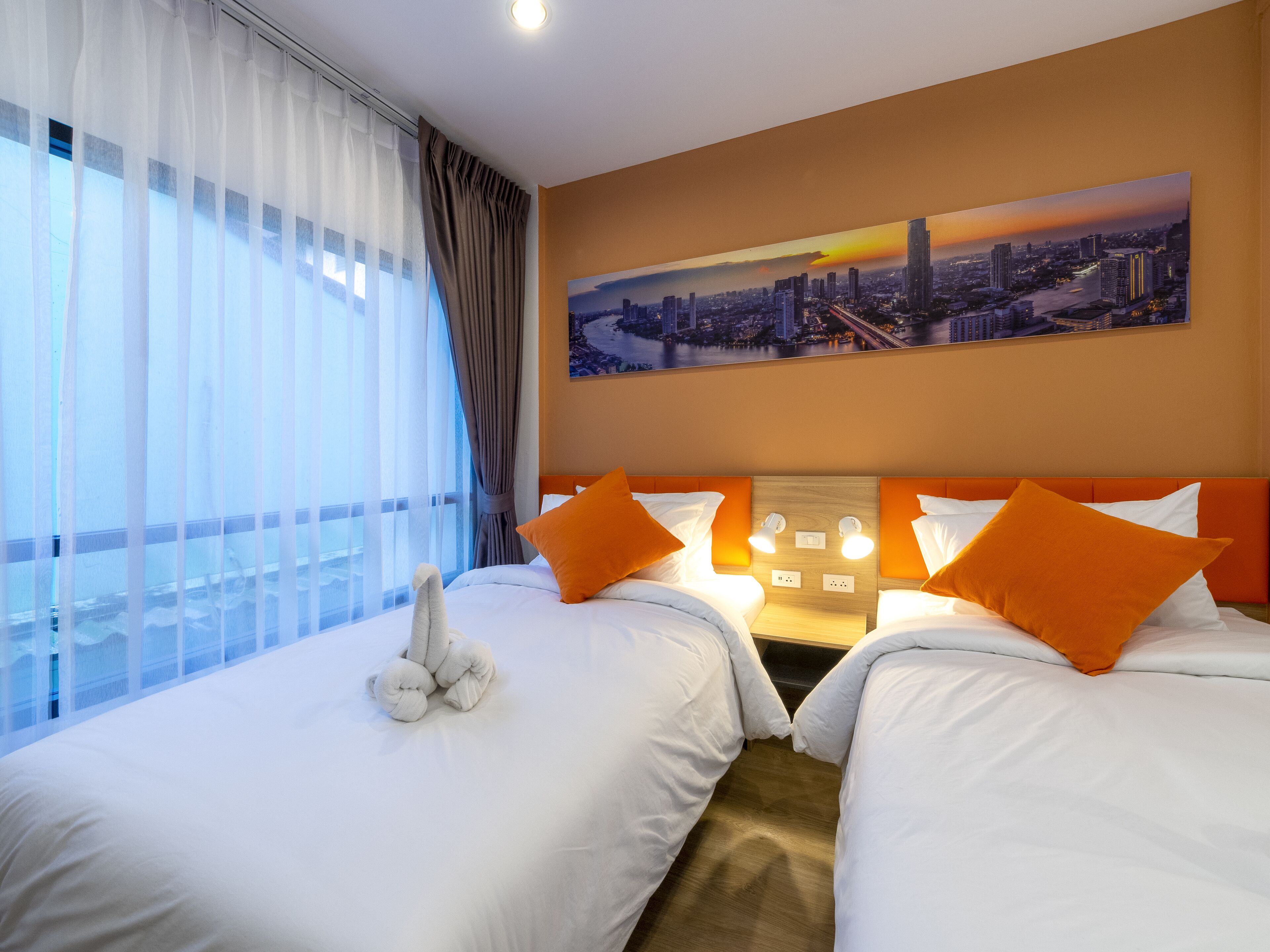 standard twin room | in-room safe, desk, blackout curtains, soundproofing