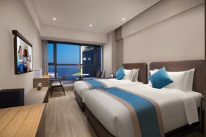 Deluxe studio, 2 eenpersoonsbedden | Hypoallergeen beddengoed, een kluis op de kamer, individueel gedecoreerd