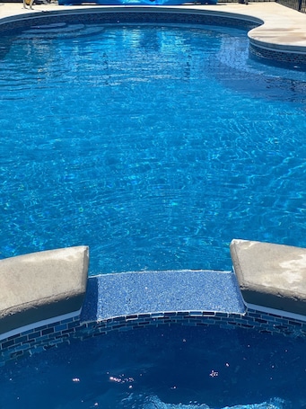 Outdoor pool, a heated pool. Walkout suite with private pool, close to I-81, VT, RU, aquatic center & Rec