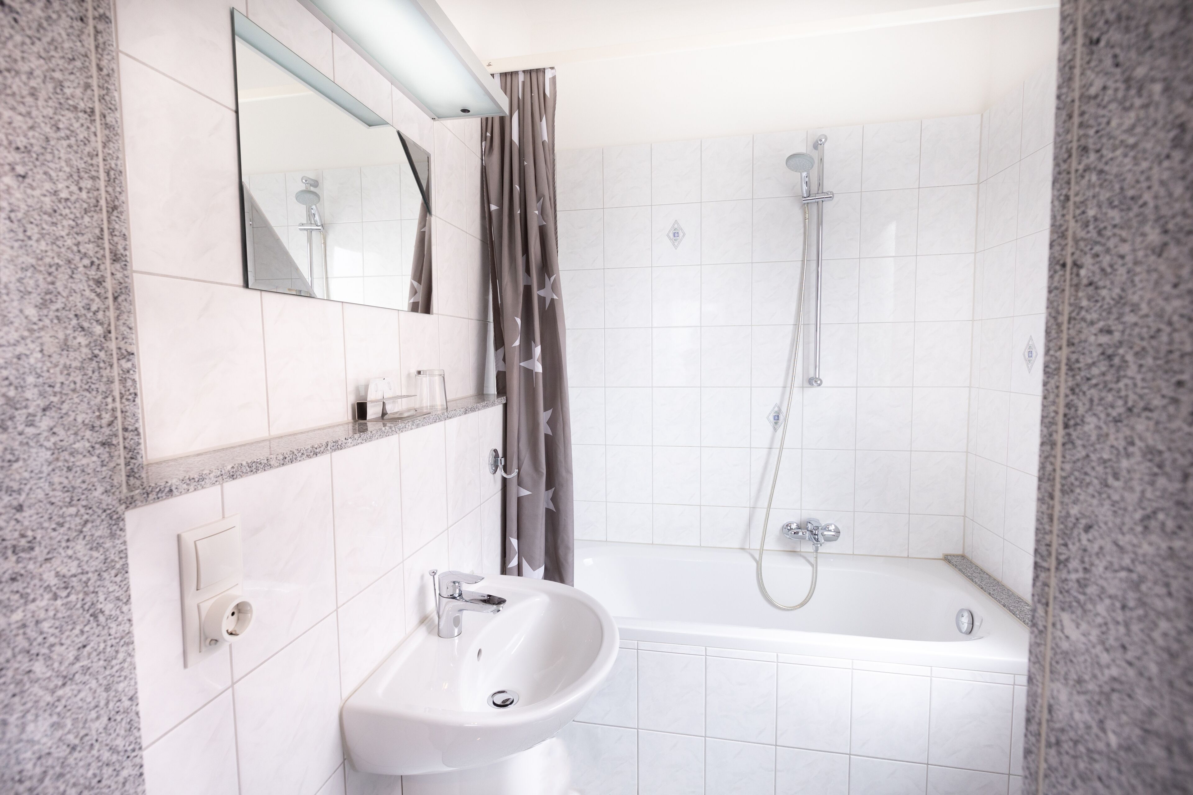 standard single room | bathroom | shower, hair dryer, towels, soap
