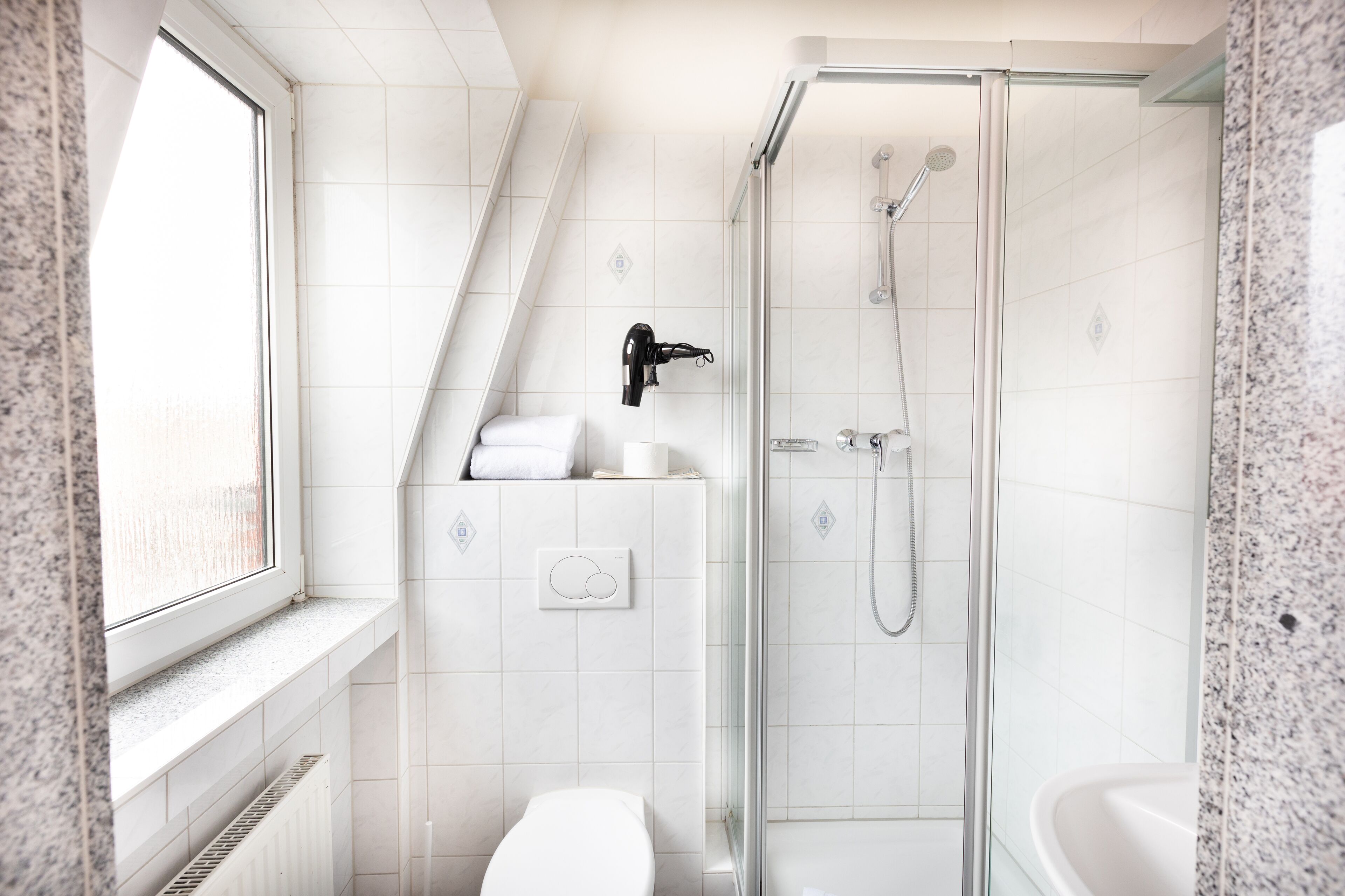 standard double or twin room | bathroom | shower, hair dryer, towels, soap