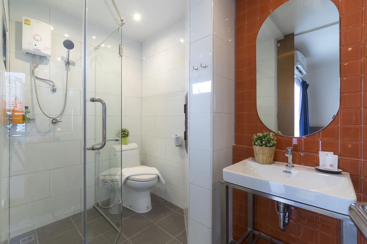 shower, free toiletries, hair dryer, dressing gowns