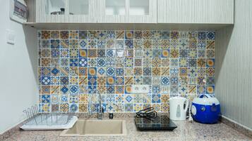 Room | Private kitchen | Fridge, stovetop, electric kettle, cookware/dishes/utensils