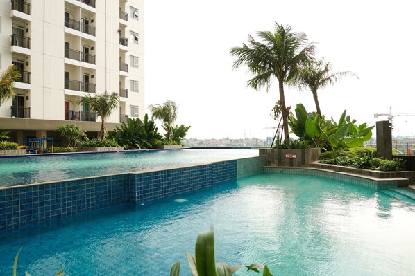 Outdoor pool - Modern Studio Apartment at Cinere Resort (Depok)