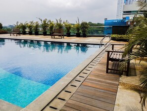Outdoor pool - Homey Studio Room Tree Park Apartment near BSD City (South Tangerang)