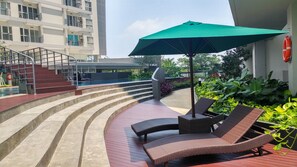 Sundeck - Homey Studio at Casa De Parco Apartment (Pagedangan)