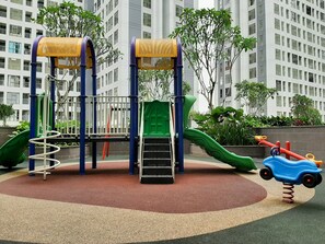 Children’s play area – outdoor - Comfy 2BR at M-Town Residence Apartment (Gading Serpong)