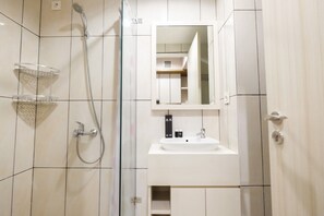 Room | Bathroom | Shower, towels - Best Furnished Studio @ Grand Kamala Lagoon Apartment (Bekasi)