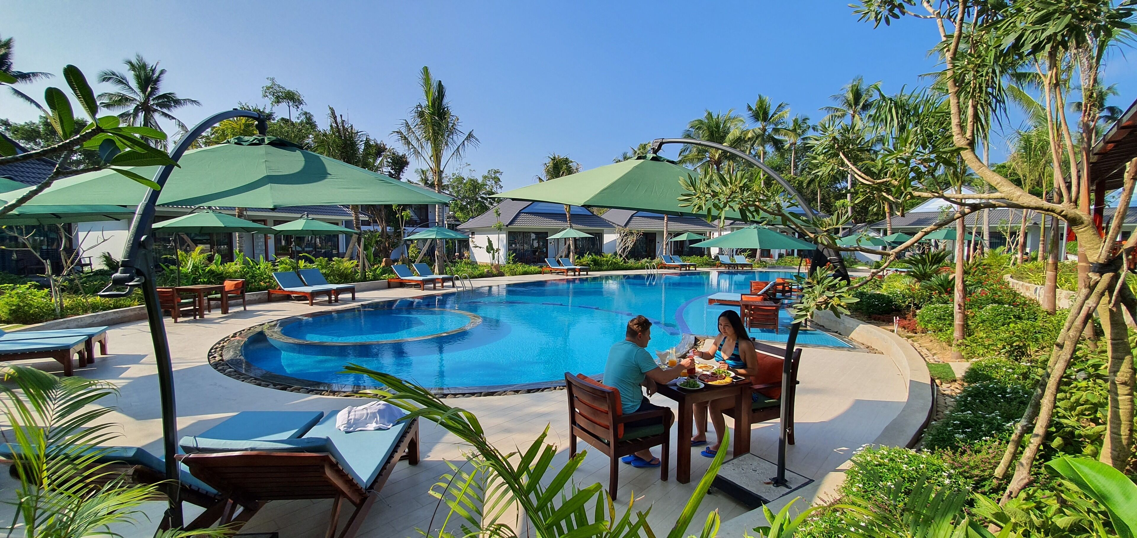 Outdoor pool, open 8:00 AM to 6:00 PM, pool umbrellas, sun loungers