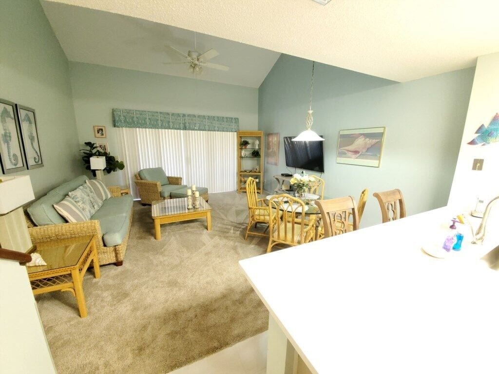 Condo, Multiple Beds, Balcony, Garden View | Living area | 40-inch TV with digital channels