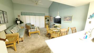 Condo, Multiple Beds, Balcony, Garden View | Living area | 40-inch TV with digital channels