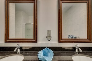 Combined shower/tub, hair dryer, towels, soap