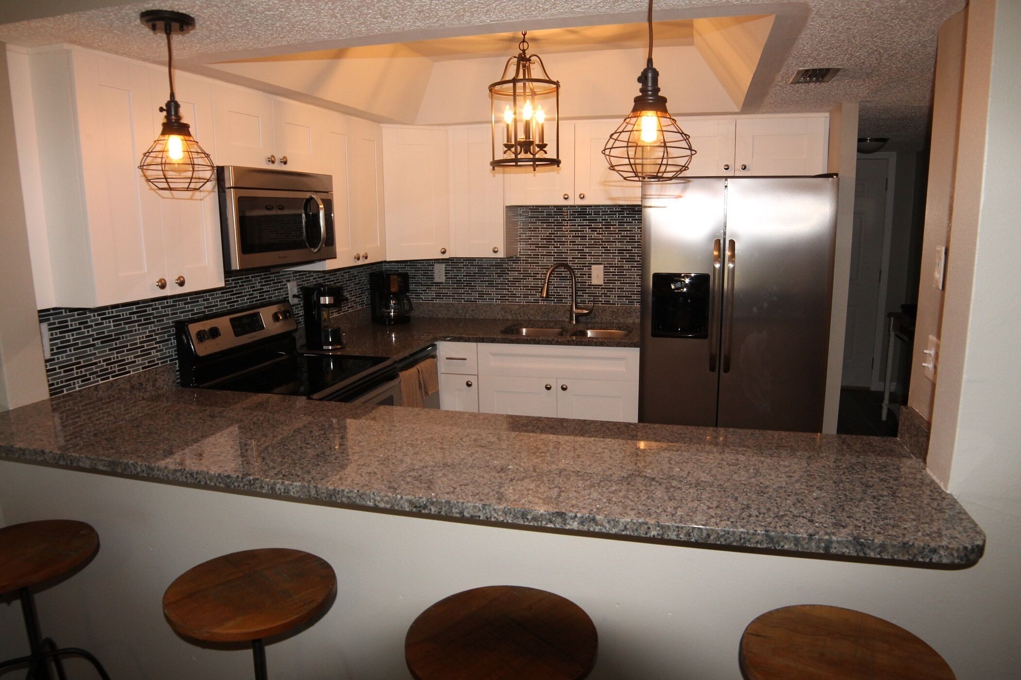 Condo, Multiple Beds, Patio, Garden View | Private kitchen | Fridge, microwave, stovetop, dishwasher
