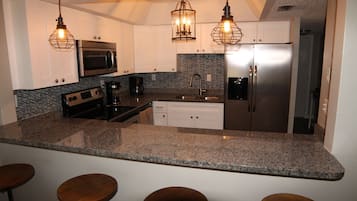 Condo, Multiple Beds, Patio, Garden View | Private kitchen | Fridge, microwave, stovetop, dishwasher