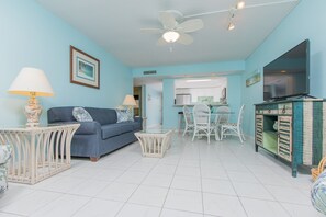 Condo, Multiple Beds, Balcony, Garden View | Living room | 40-inch TV with digital channels