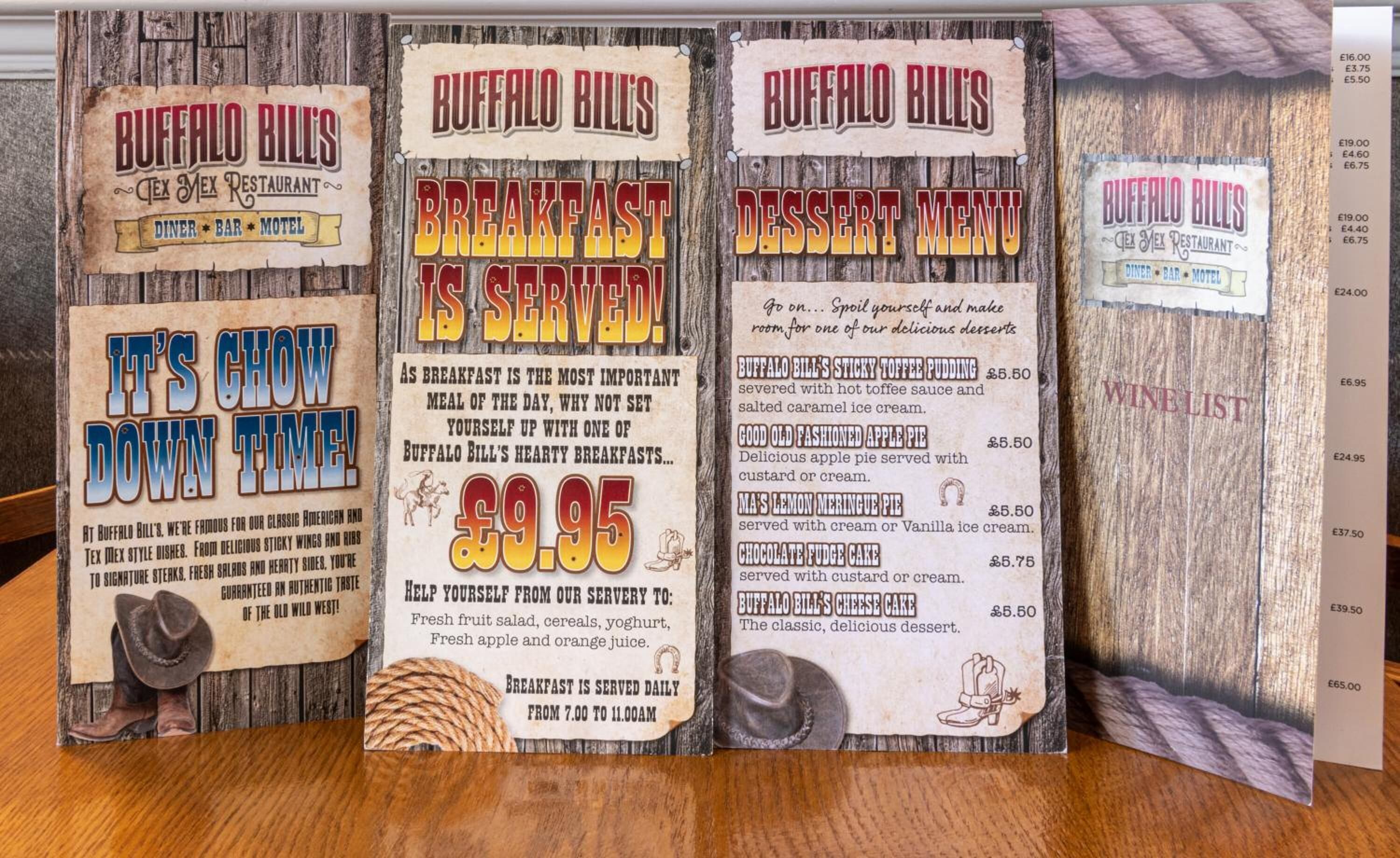Three signs for Buffalo Bill's Tex Mex Restaurant, detailing breakfast and dessert menu prices.