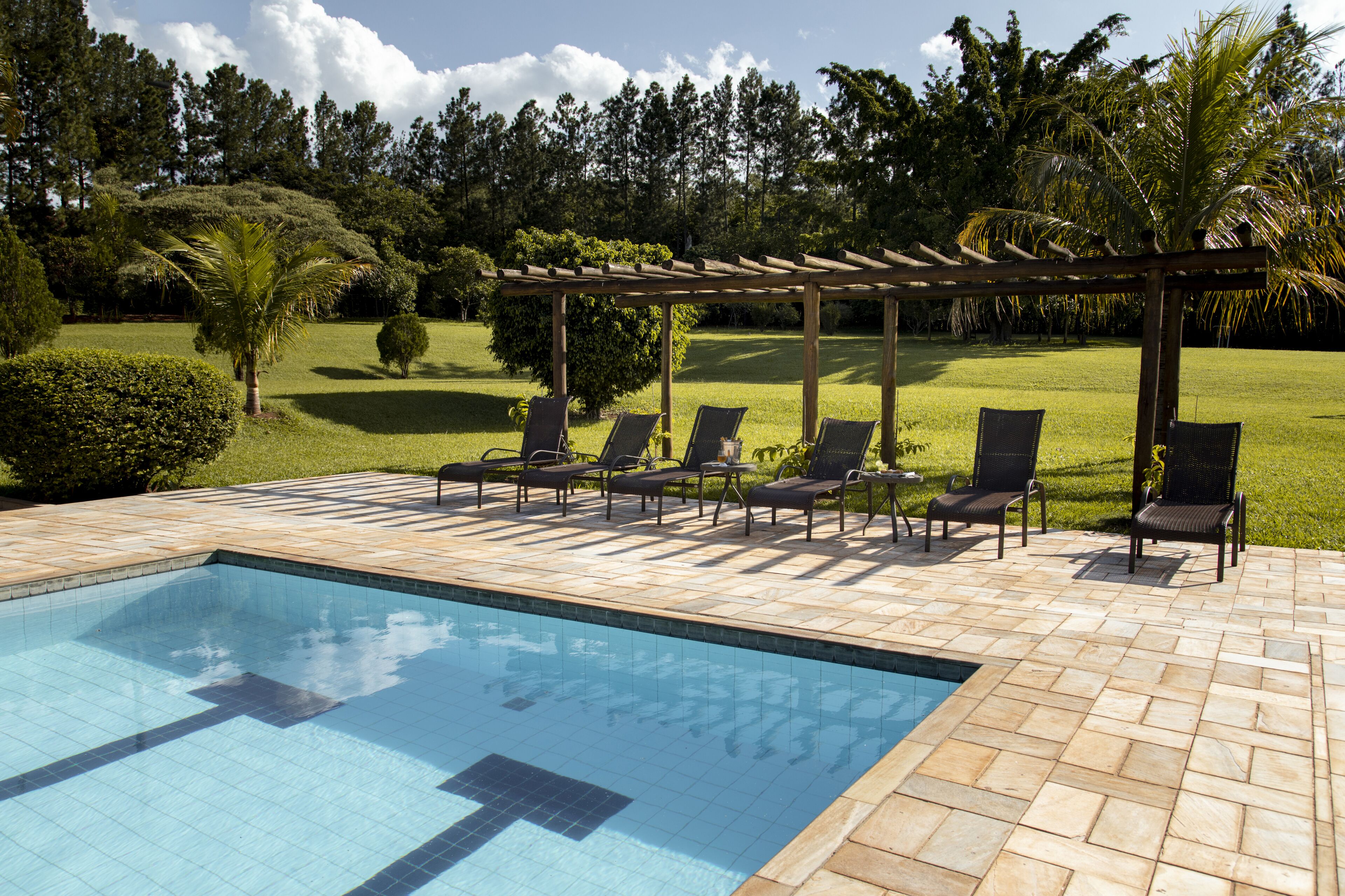 outdoor pool, pool umbrellas, pool loungers