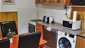 Apartment, 2 Bedrooms, Terrace | Private kitchen | Coffee/tea maker, fridge, microwave, oven - Apartmány Centro (Piestany)